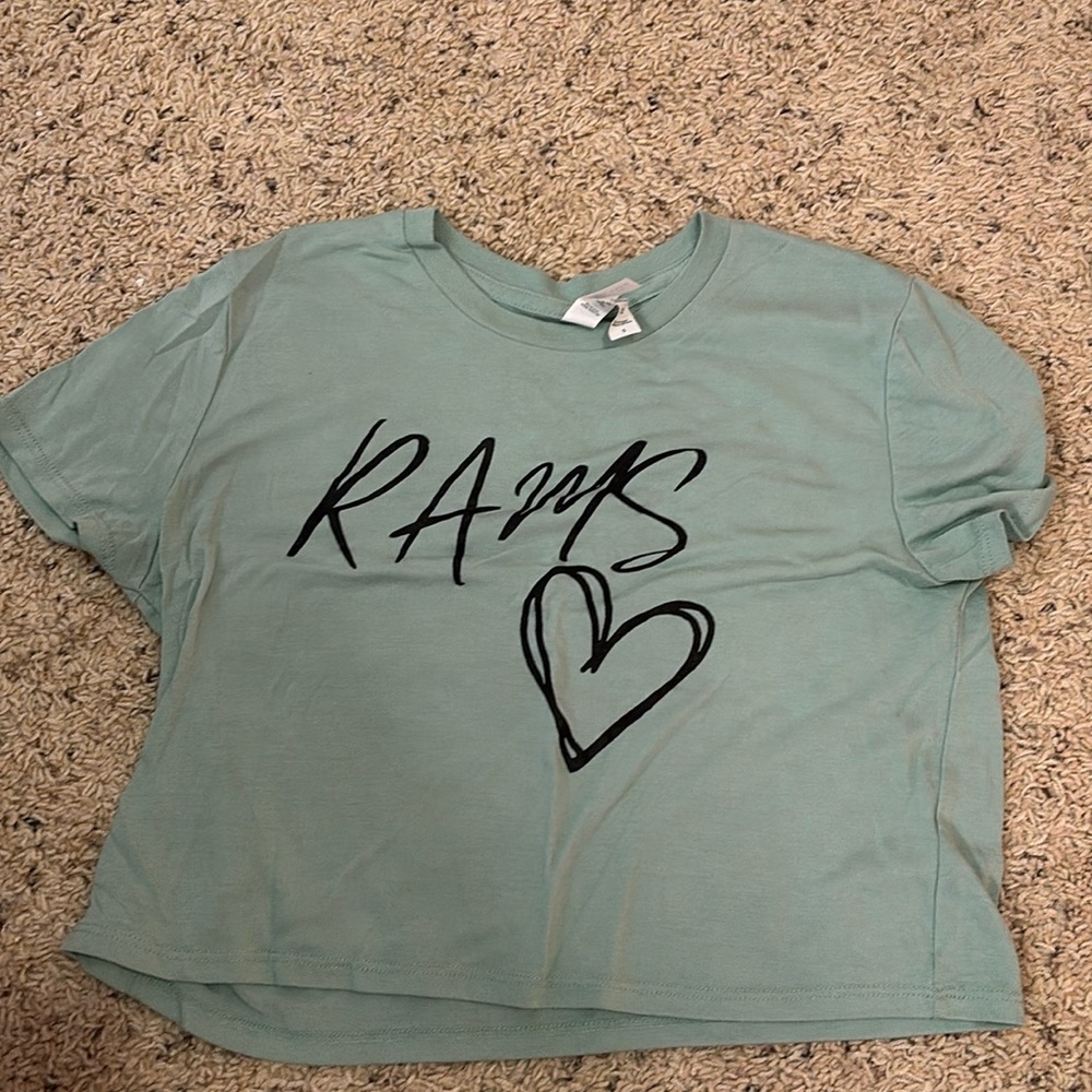 School brand in size small and it’s a light green blue color